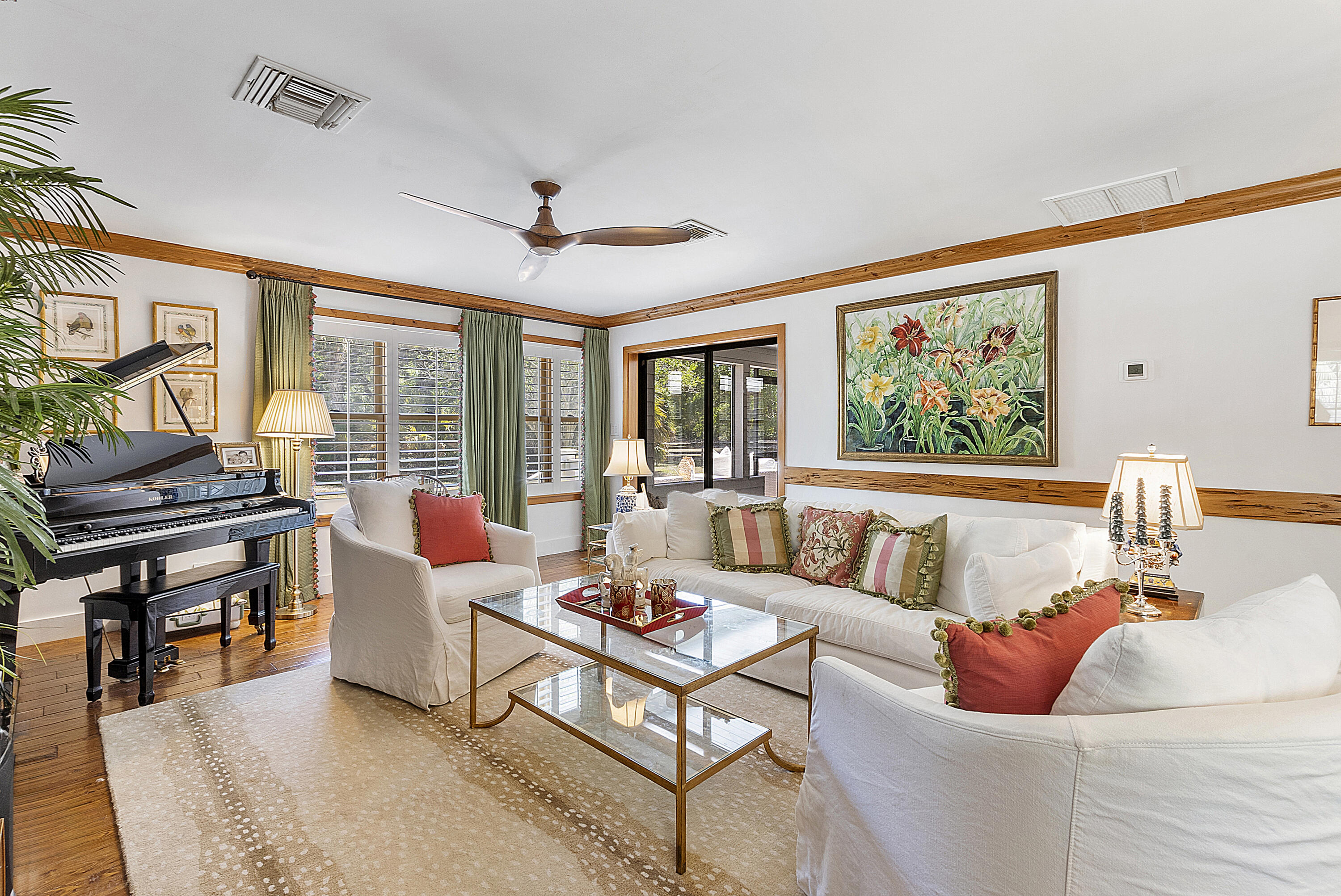 32801 Highway 441, Unit 64 Okeechobee, FL 34972 - Photo 20 of 138 a living room with furniture and a flat screen tv
