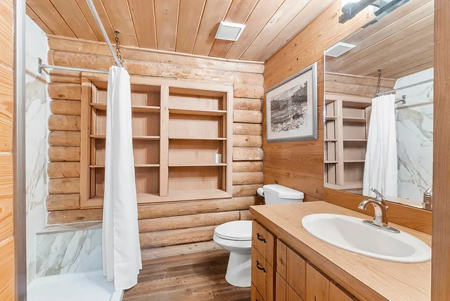 a view of a street with a yard