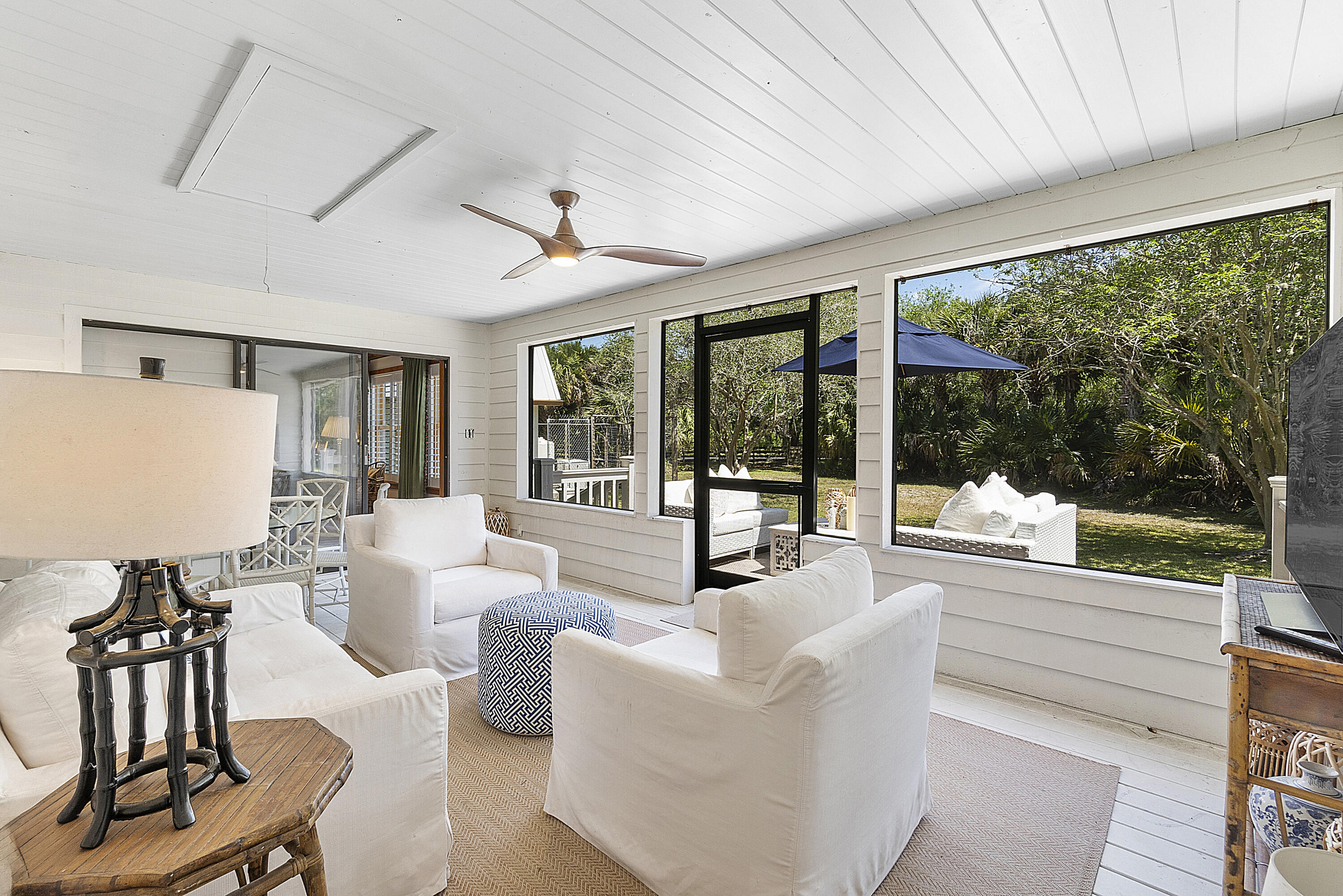 32801 Highway 441, Unit 64 Okeechobee, FL 34972 - Photo 28 of 138 a living room with furniture and large windows