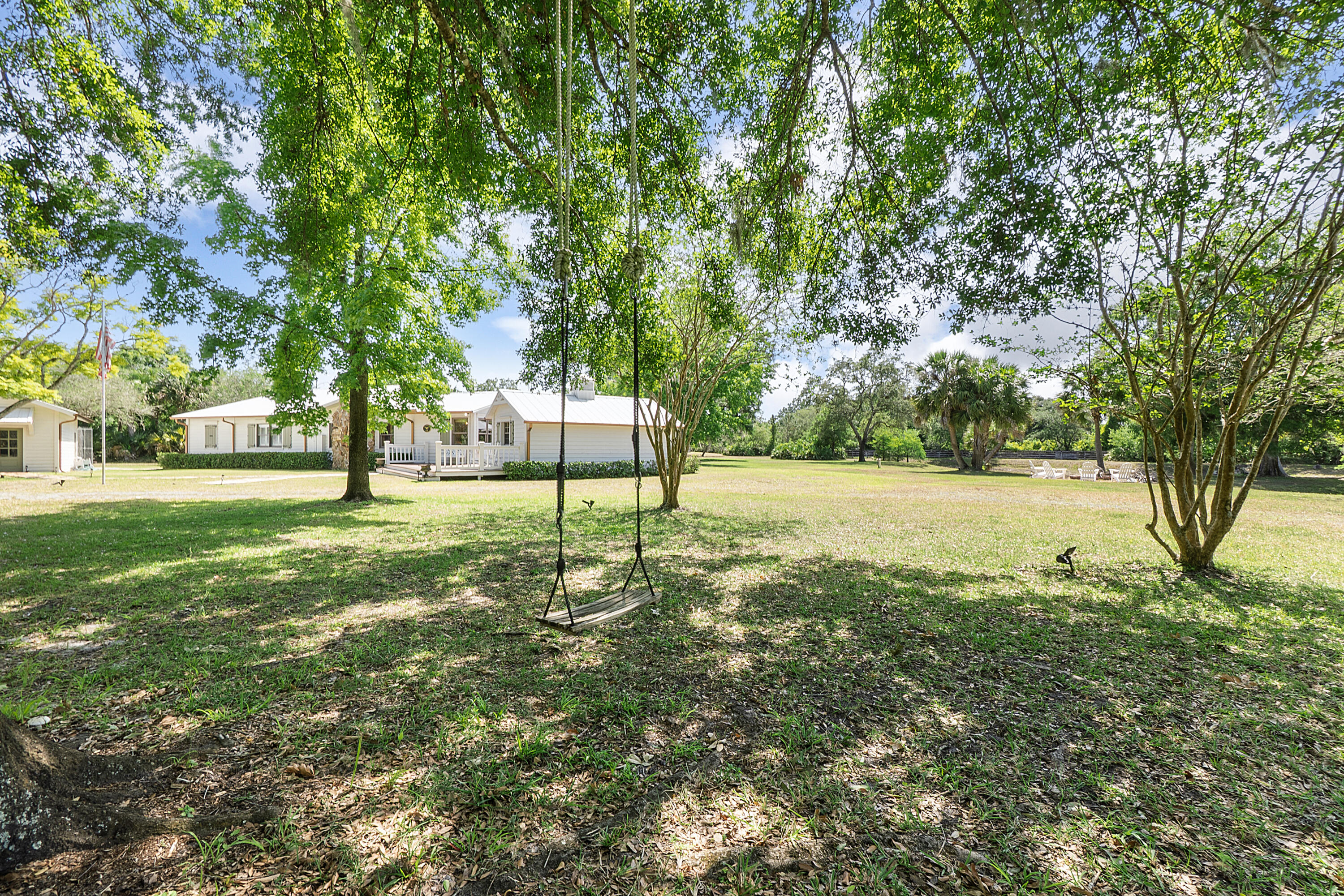 32801 Highway 441, Unit 64 Okeechobee, FL 34972 - Photo 44 of 138 a view of a tree in a yard