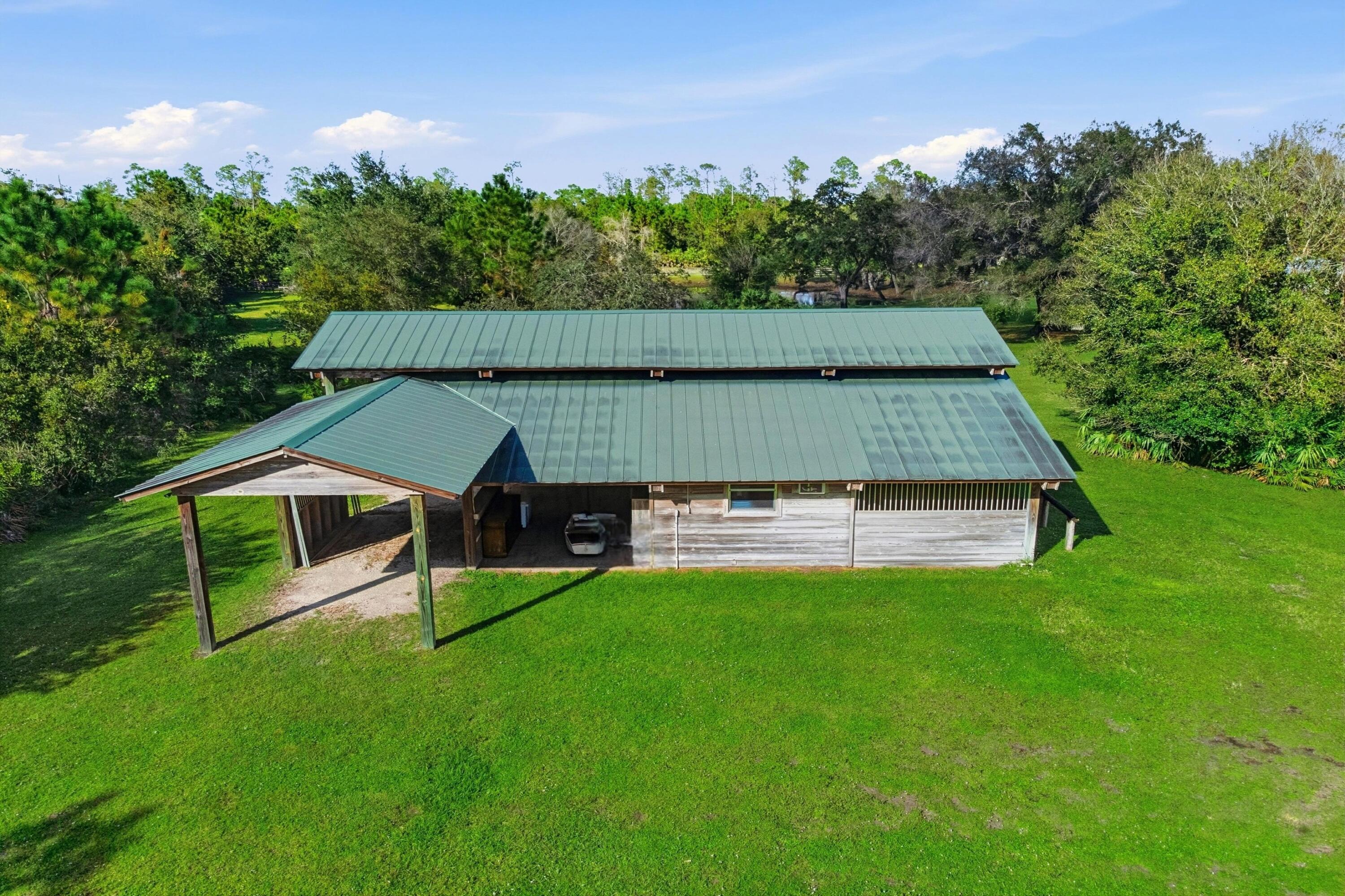 32801 Highway 441, Unit 64 Okeechobee, FL 34972 - Photo 59 of 138 a aerial view of a house