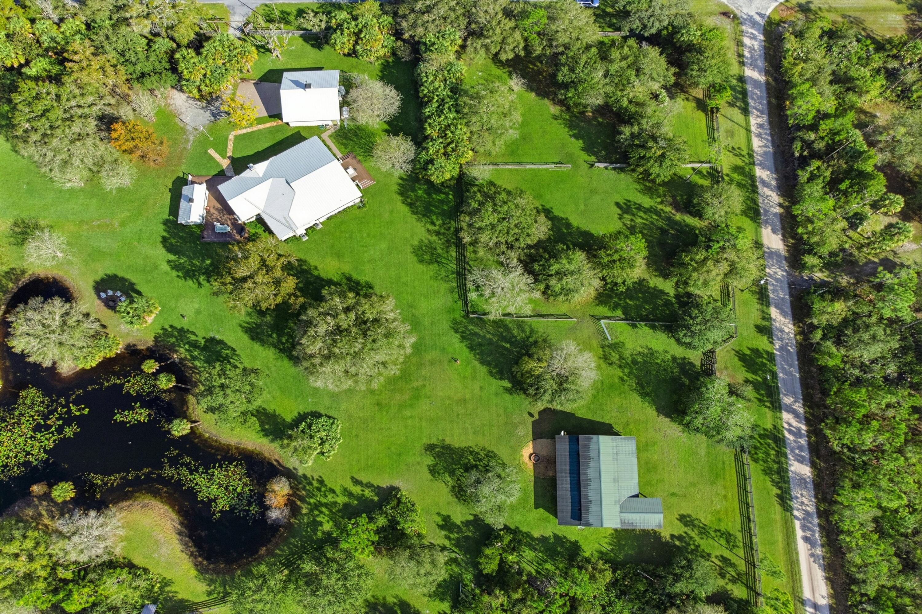 32801 Highway 441, Unit 64 Okeechobee, FL 34972 - Photo 62 of 138 DJI_0979_AHDR_grass_6d94d1b4-f3b5-453b-8