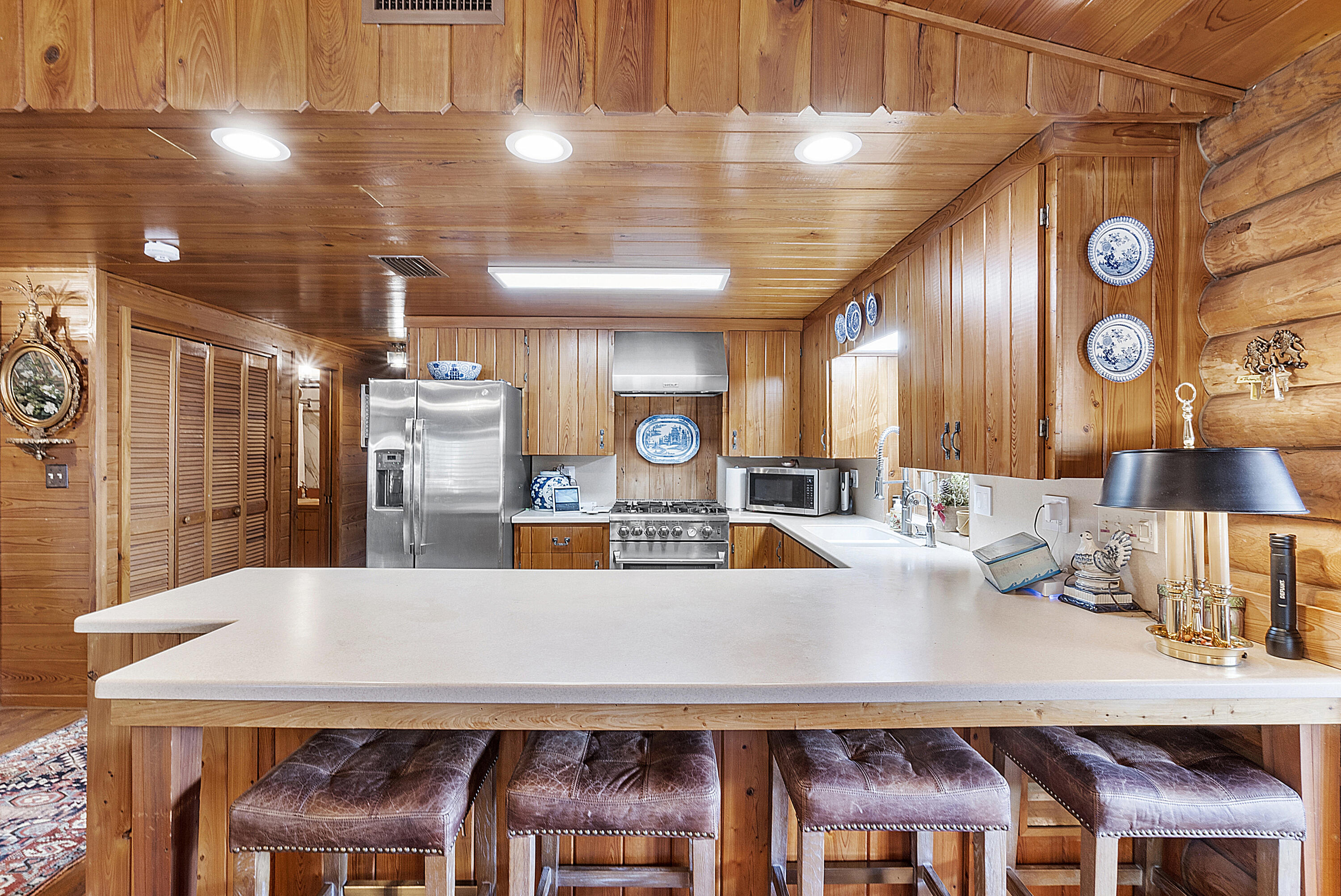32801 Highway 441, Unit 64 Okeechobee, FL 34972 - Photo 7 of 138 a large kitchen with a table and chairs