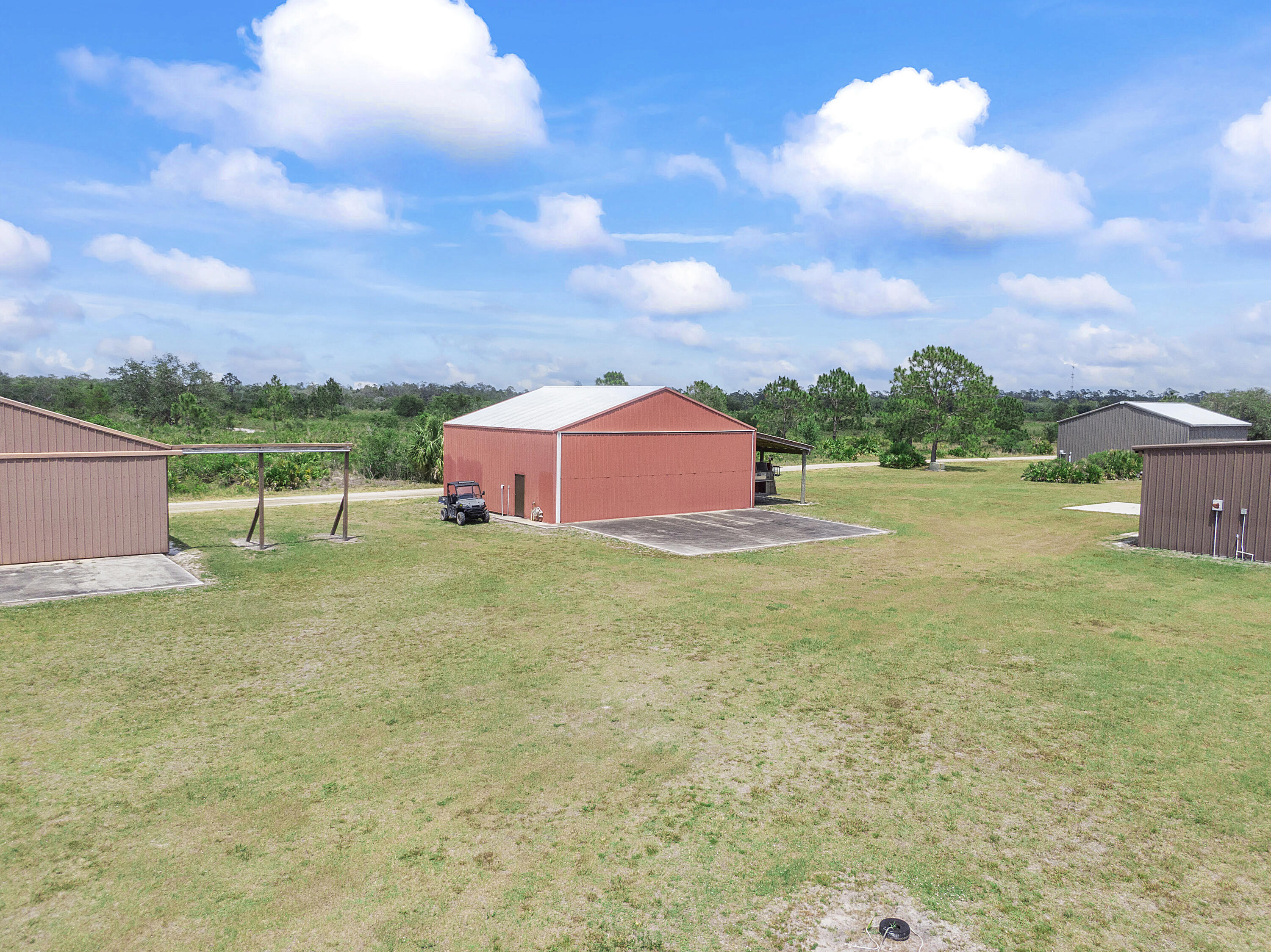 32801 Highway 441, Unit 64 Okeechobee, FL 34972 - Photo 80 of 138 a view of a lake with a yard