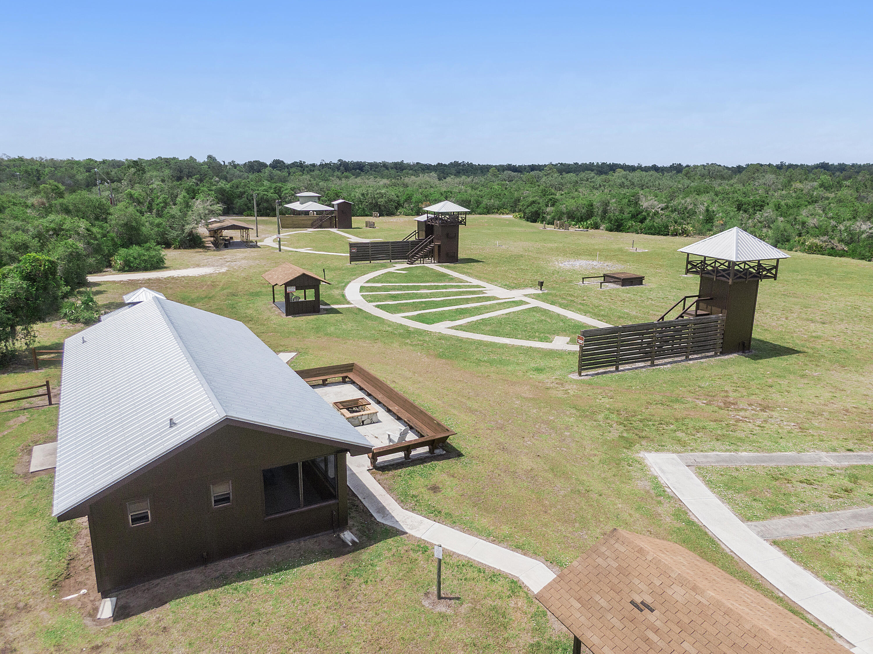 32801 Highway 441, Unit 64 Okeechobee, FL 34972 - Photo 83 of 138 a view of a swimming pool with a patio