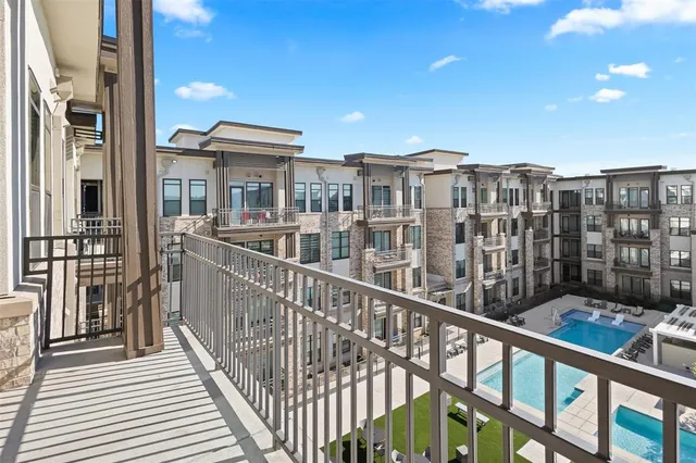 a view of a building from a balcony