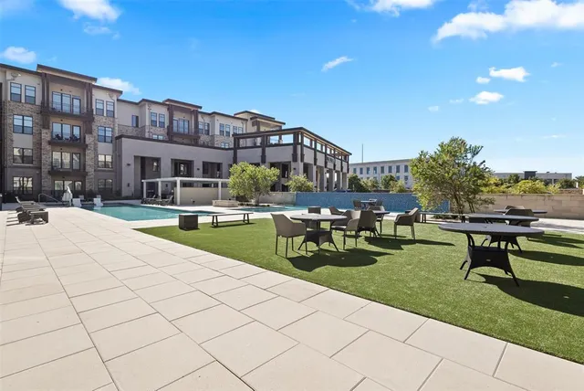 a outdoor space with lots of table and chairs