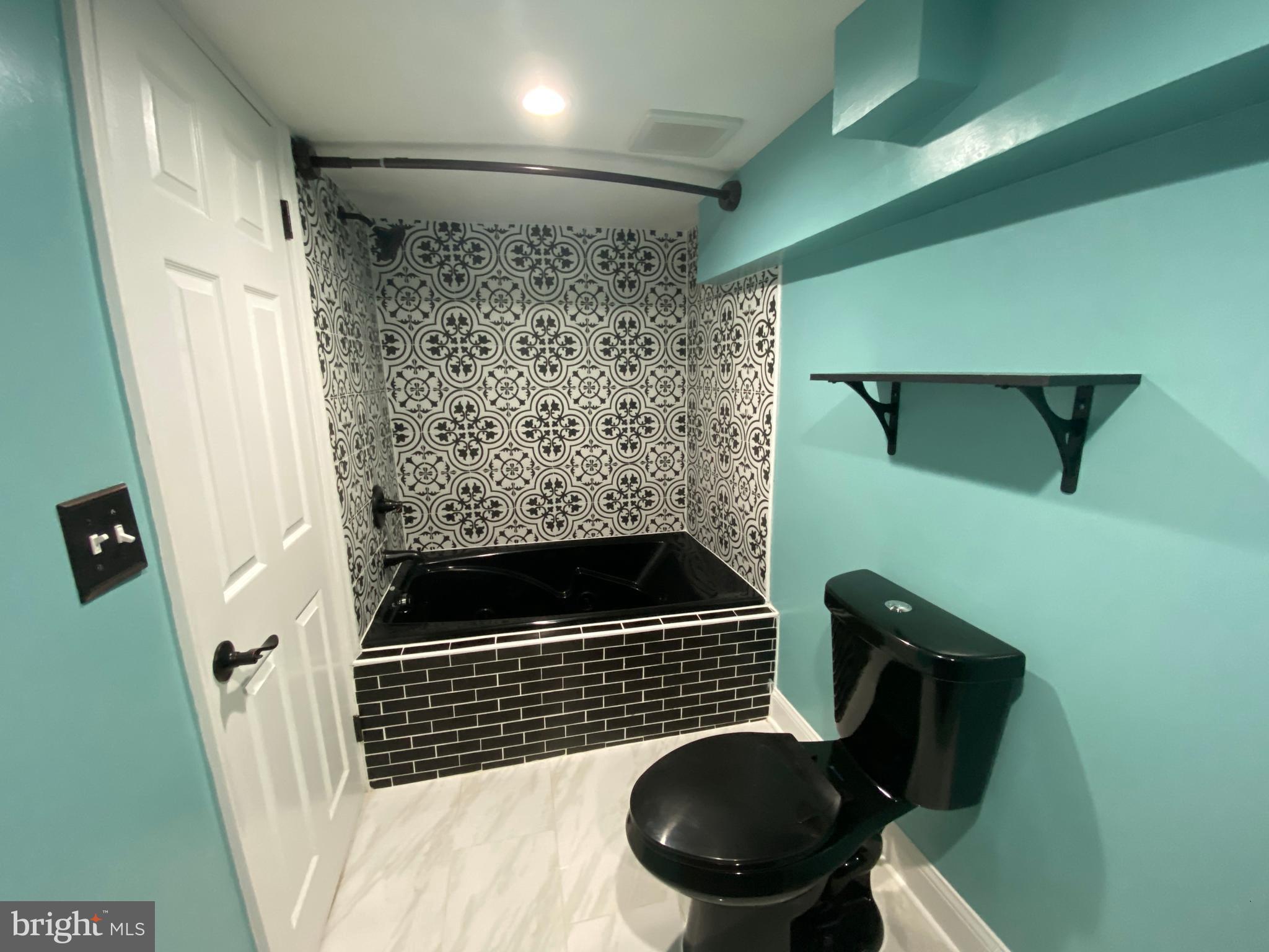 18 South Hawthorne Road Middle River, MD 21220 - Photo 42 of 53 Custom 2nd bathroom with spa tub.