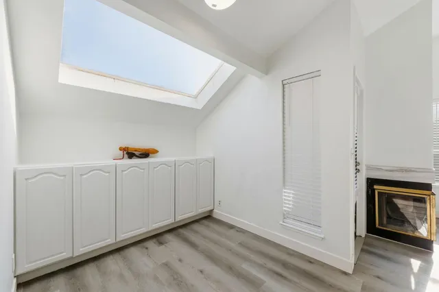 a view of a hallway with closet area