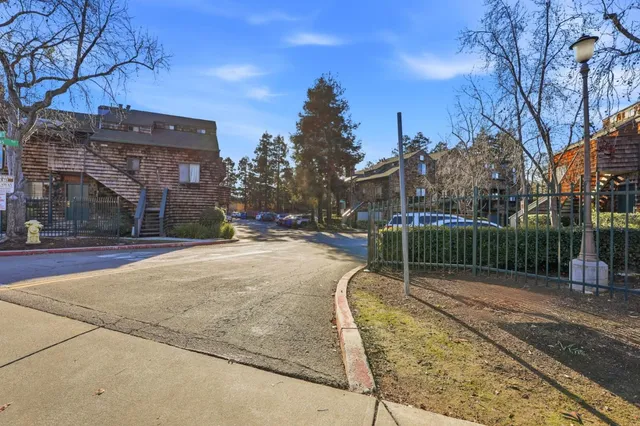 a swimming pool with a bench in front of it