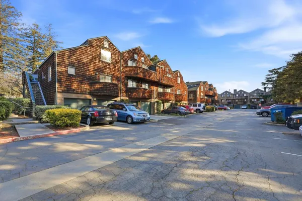 a view of a street with cars