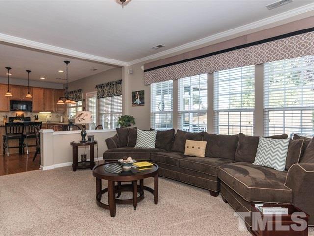 3319 Cathedral Bell Road Raleigh, NC 27614 - Photo 12 of 25 Family room is open to the breakfast area and kitchen so the chef of the family never feels left out.