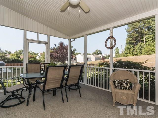 3319 Cathedral Bell Road Raleigh, NC 27614 - Photo 22 of 25 Cool fall nights are just around the corner and this screened porch is where you will want to be! This large porch offers plenty of room for a table and separate sitting area!