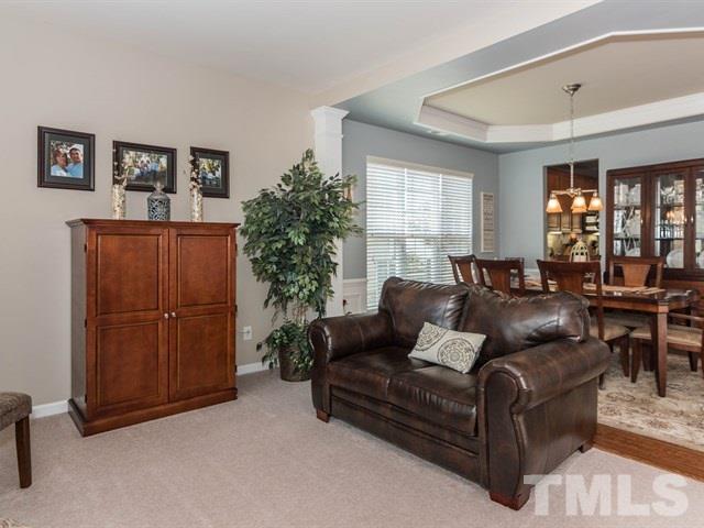 3319 Cathedral Bell Road Raleigh, NC 27614 - Photo 5 of 25 Open to the formal dining room, the living room is where you will want to retreat to after a delicious meal!
