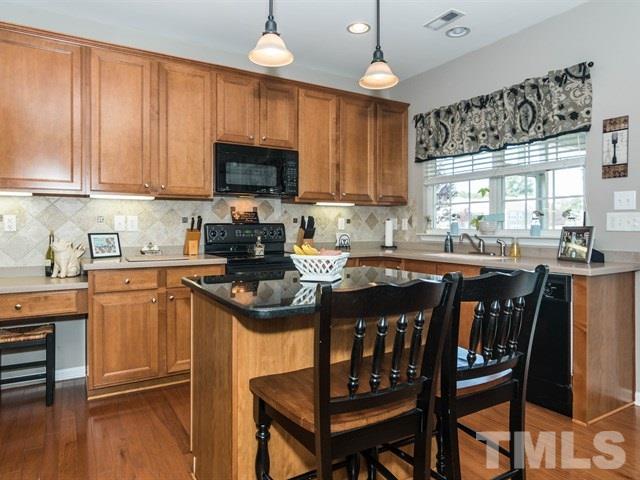 3319 Cathedral Bell Road Raleigh, NC 27614 - Photo 25 of 25 They say the kitchen is the heart of the home and that certainly holds true with this open floor plan kitchen!