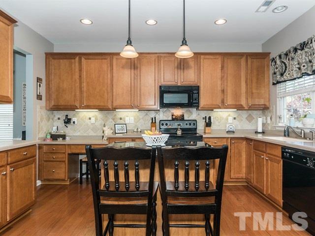 3319 Cathedral Bell Road Raleigh, NC 27614 - Photo 7 of 25 Plenty of cabinet space for all of your kitchen storage needs!