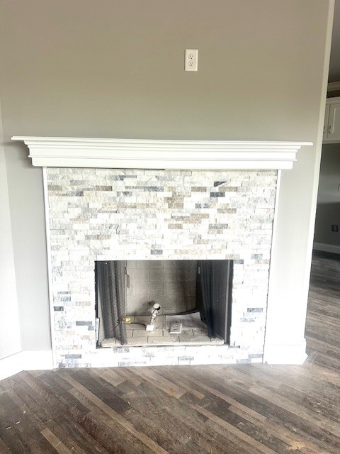 8369 State Line Road Taft, TN 38488 - Photo 11 of 20 a view of living room with a fireplace and wooden floor