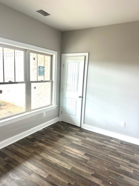 8369 State Line Road Taft, TN 38488 - Photo 12 of 20 a view of an empty room with wooden floor and a window