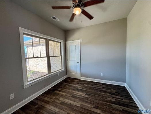 8369 State Line Road Taft, TN 38488 - Photo 16 of 25 a view of an empty room with wooden floor and a window