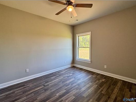 8369 State Line Road Taft, TN 38488 - Photo 17 of 25 a view of room with window and wooden floor