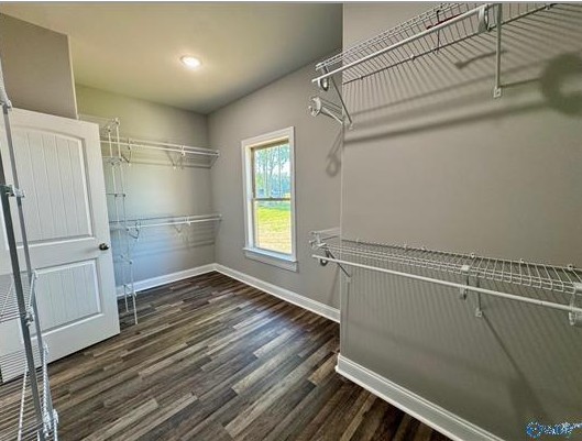 8369 State Line Road Taft, TN 38488 - Photo 19 of 25 a view of empty room with wooden floor and fan