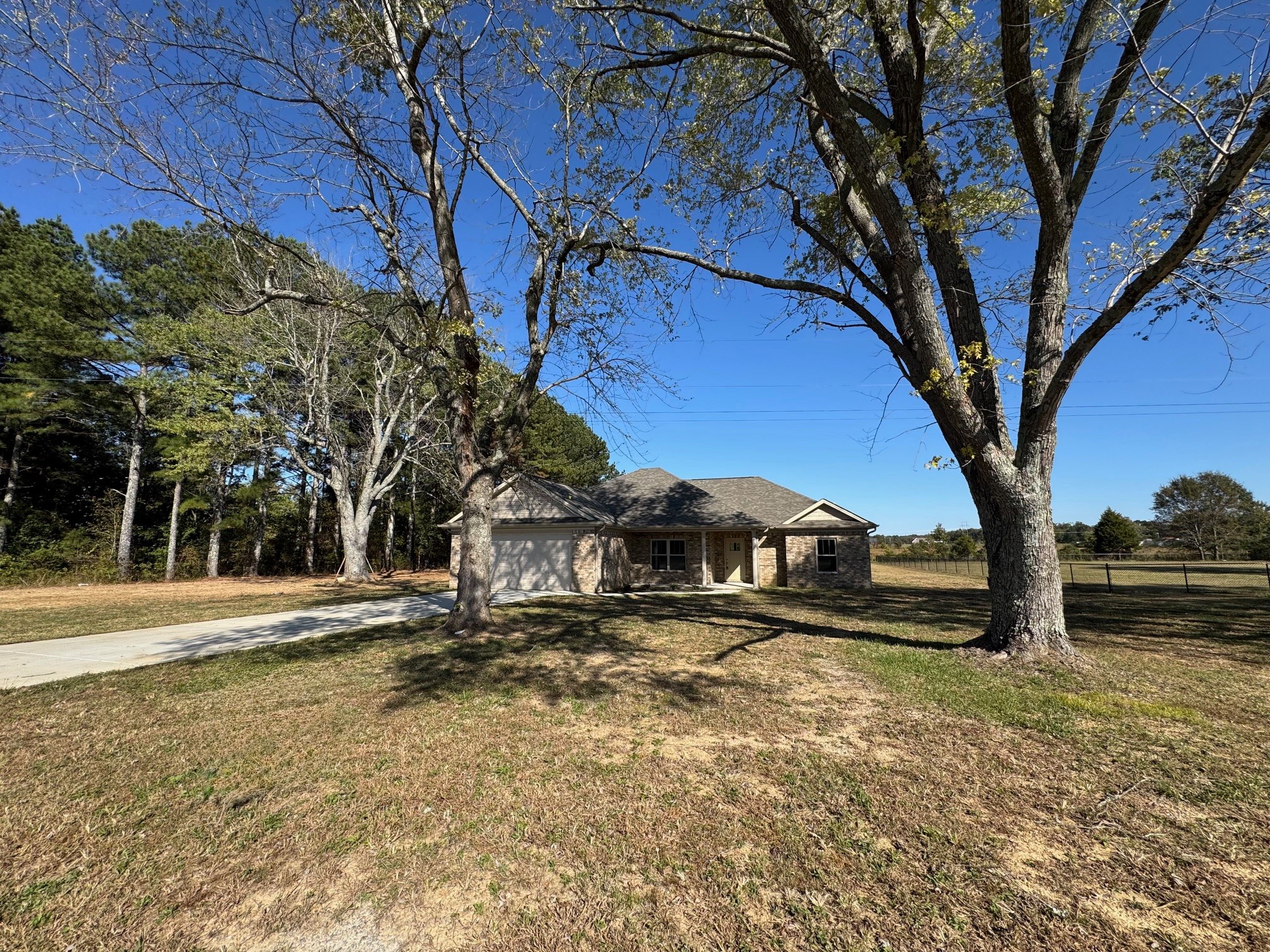 8369 State Line Road Taft, TN 38488 - Photo 2 of 22 a view of street with houses