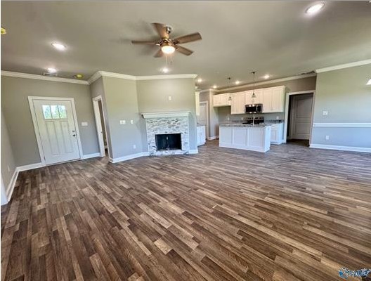 8369 State Line Road Taft, TN 38488 - Photo 7 of 22 a view of kitchen and empty room with wooden floor