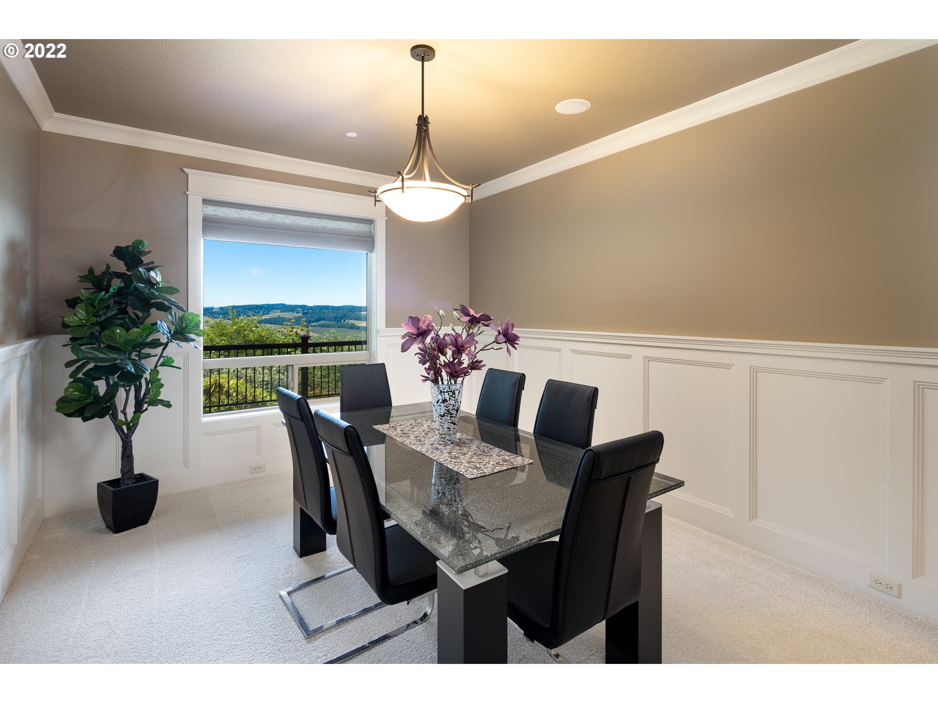 26997 Southwest Labrousse Road Sherwood, OR 97140 - Photo 11 of 32 a view of a dining room with furniture and a chandelier