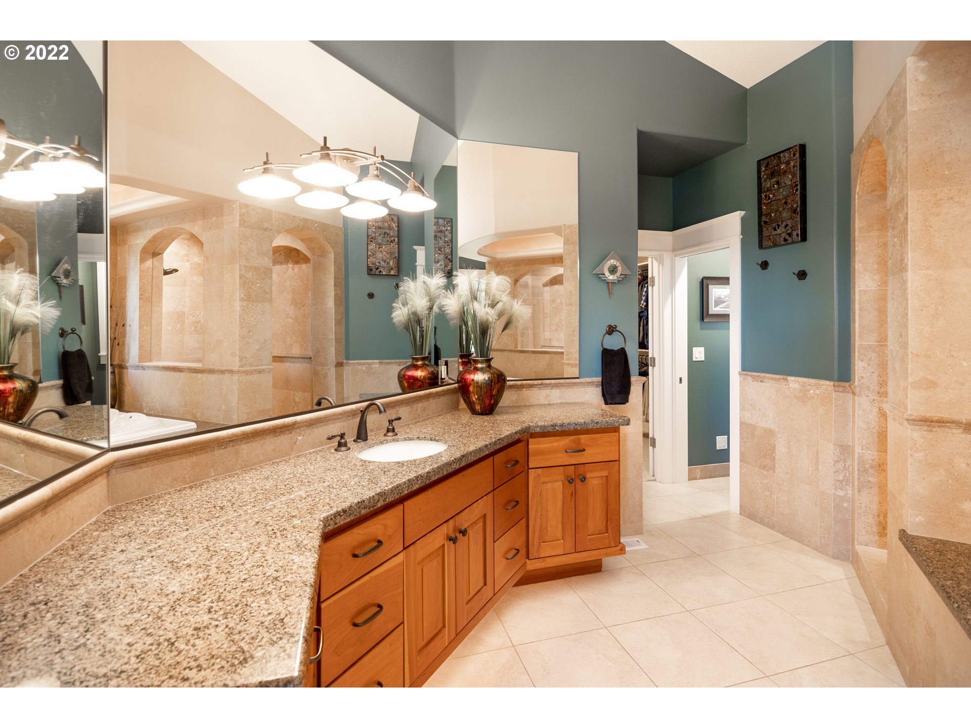 26997 Southwest Labrousse Road Sherwood, OR 97140 - Photo 18 of 32 a bathroom with a double vanity sink and a mirror