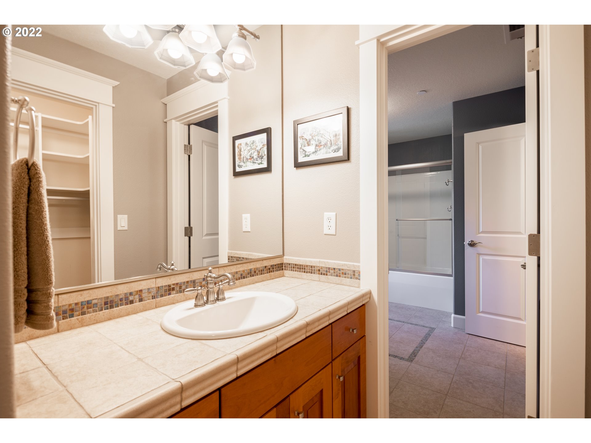 26997 Southwest Labrousse Road Sherwood, OR 97140 - Photo 26 of 32 a bathroom with a sink vanity granite shower and a mirror