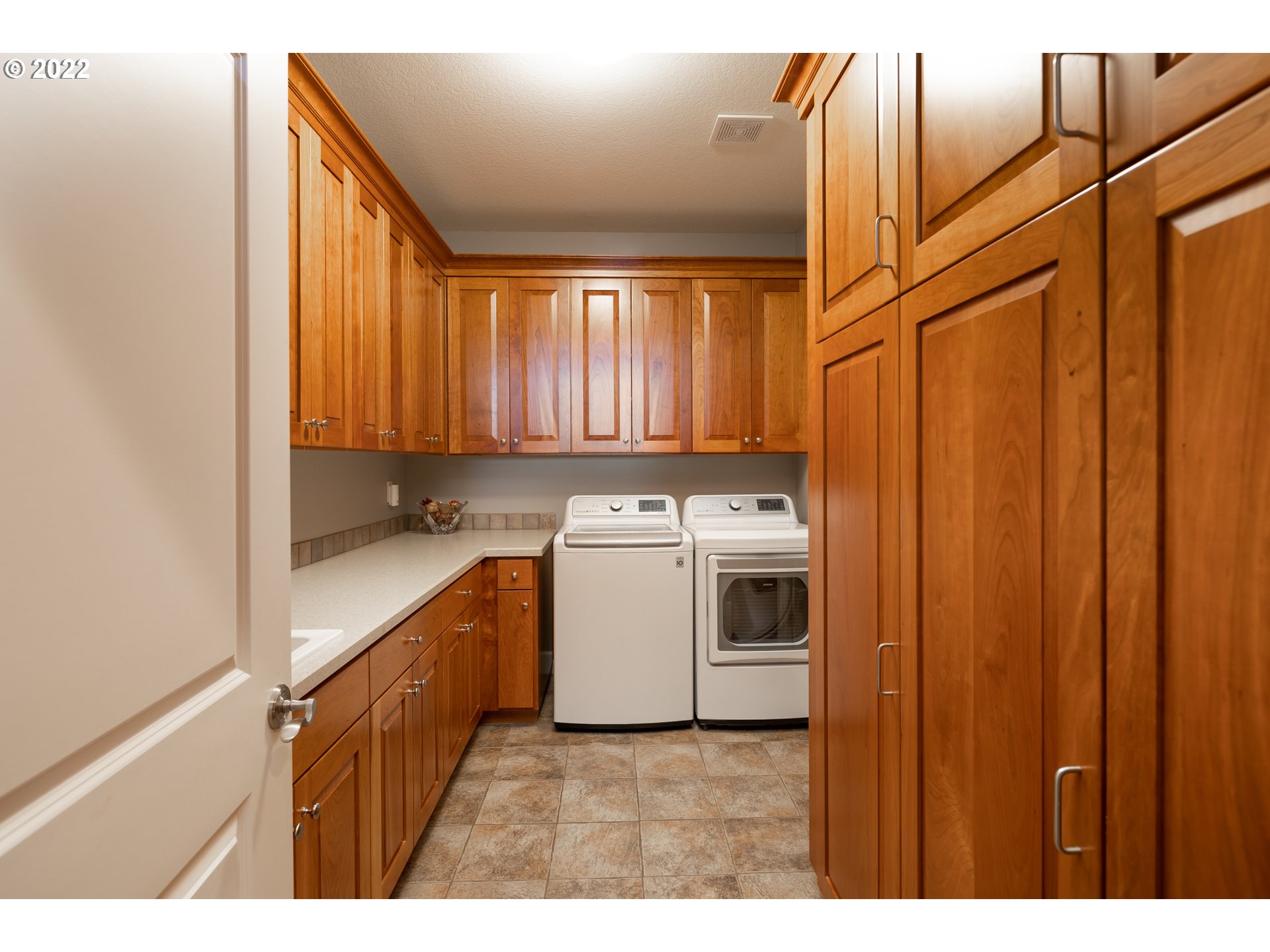 26997 Southwest Labrousse Road Sherwood, OR 97140 - Photo 28 of 32 a view of a utility room with washer and dryer
