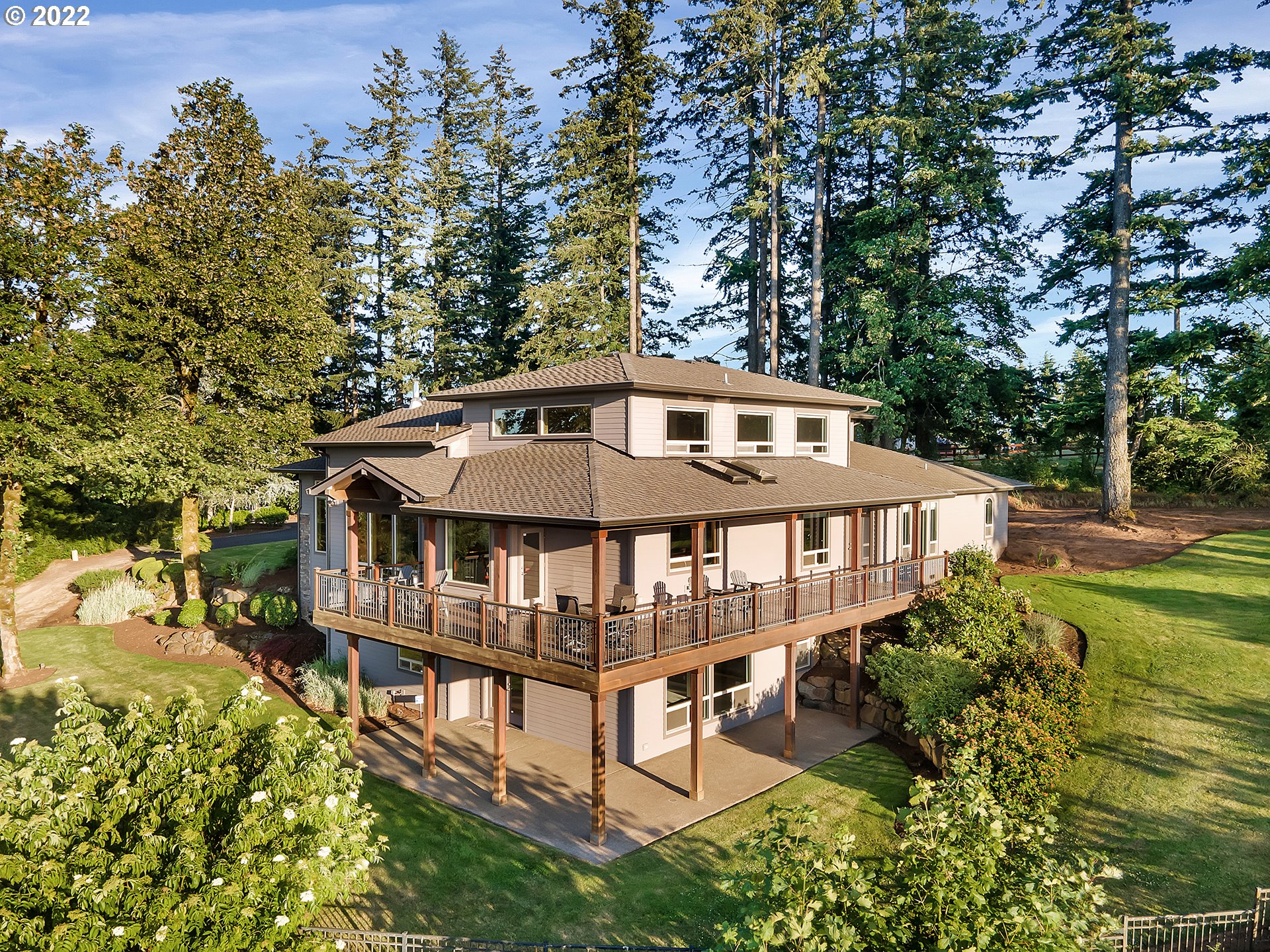 26997 Southwest Labrousse Road Sherwood, OR 97140 - Photo 29 of 32 an aerial view of a house with swimming pool and trees around