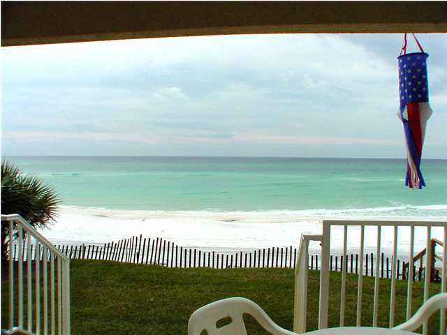 6015 Highway Santa Rosa Beach, Unit A101 30A Santa Rosa Beach, FL 32459 - Photo 14 of 18 a view of a garden and deck