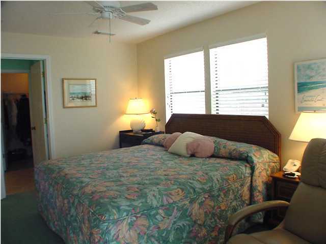 6015 Highway Santa Rosa Beach, Unit A101 30A Santa Rosa Beach, FL 32459 - Photo 5 of 18 a bedroom with a bed and window
