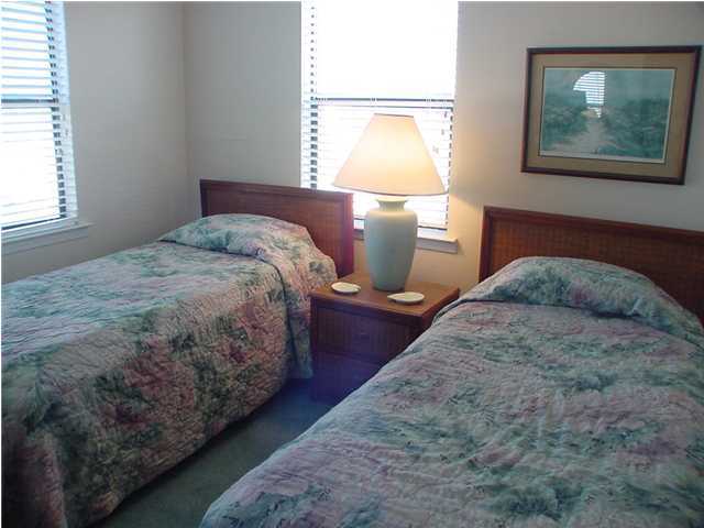 6015 Highway Santa Rosa Beach, Unit A101 30A Santa Rosa Beach, FL 32459 - Photo 7 of 18 a bedroom with a bed and window