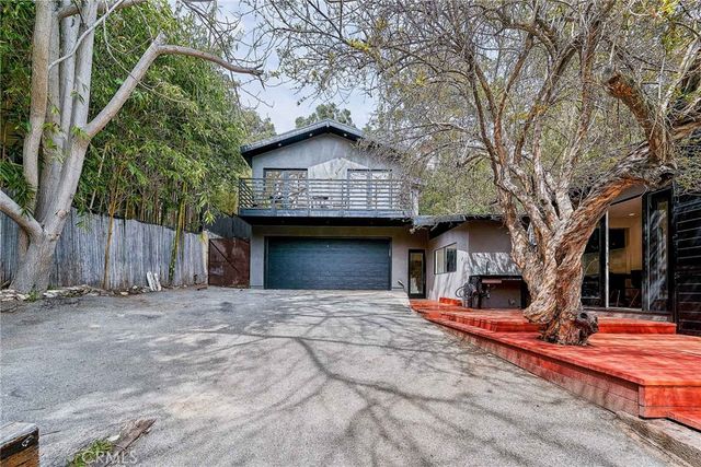 a view of a house with a patio