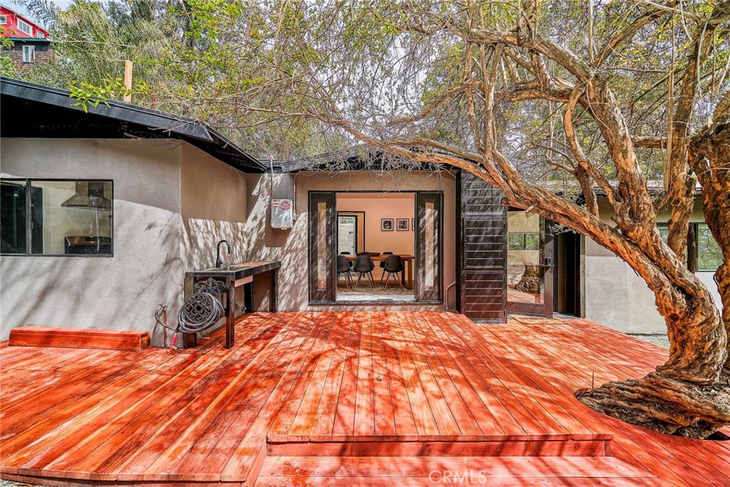 8457 Ridpath Drive Los Angeles, CA 90046 - Photo 31 of 33 a view of a house with a patio