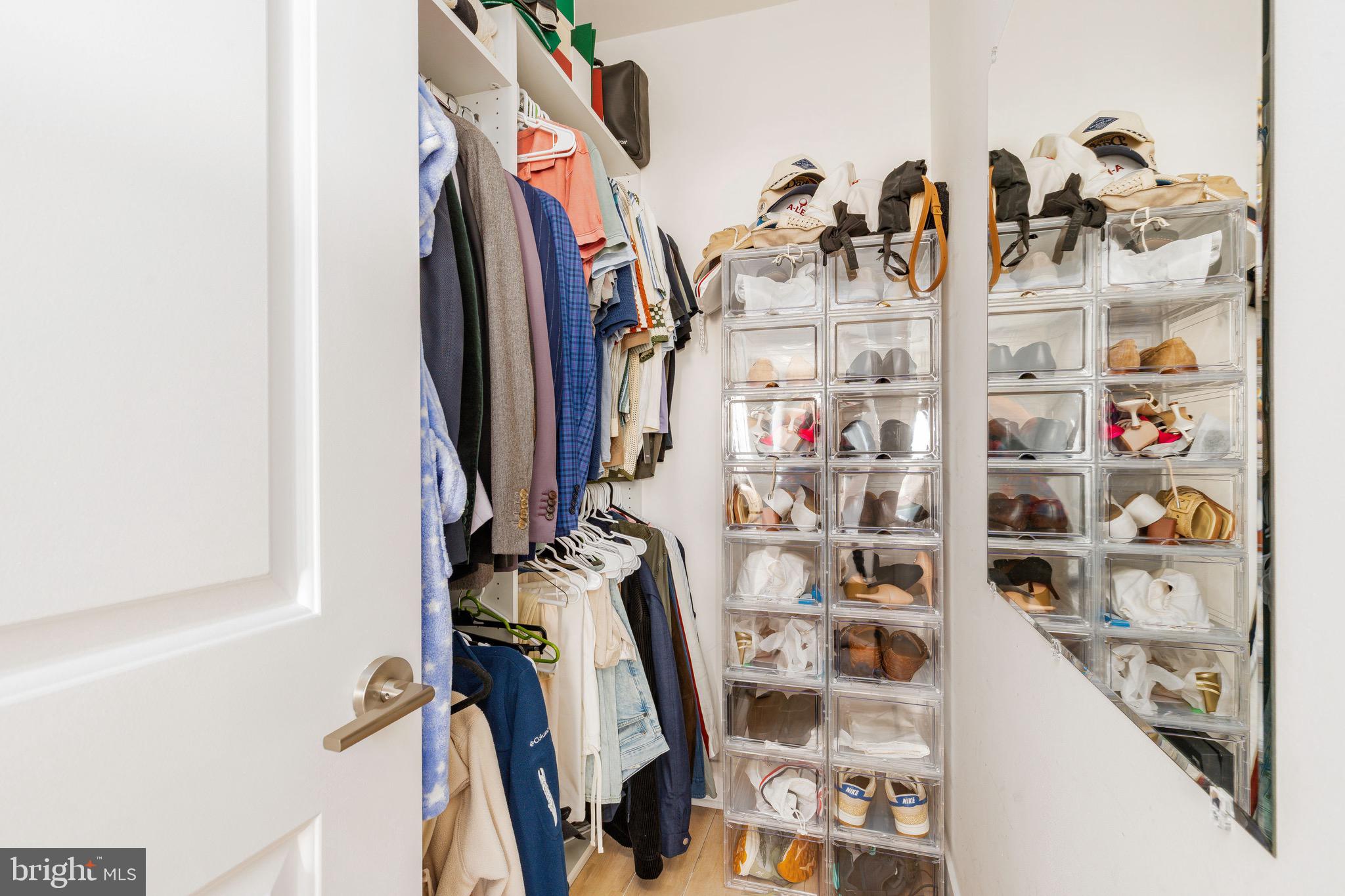 1733 Carpenter Street, Unit D Philadelphia, PA 19146 - Photo 21 of 37 a view of walk in closet with clothes and shoes