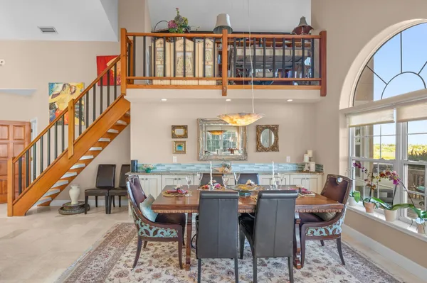 a very nice looking kitchen with a large window