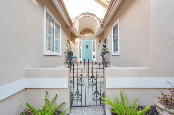 a living room with fireplace furniture and a flat screen tv