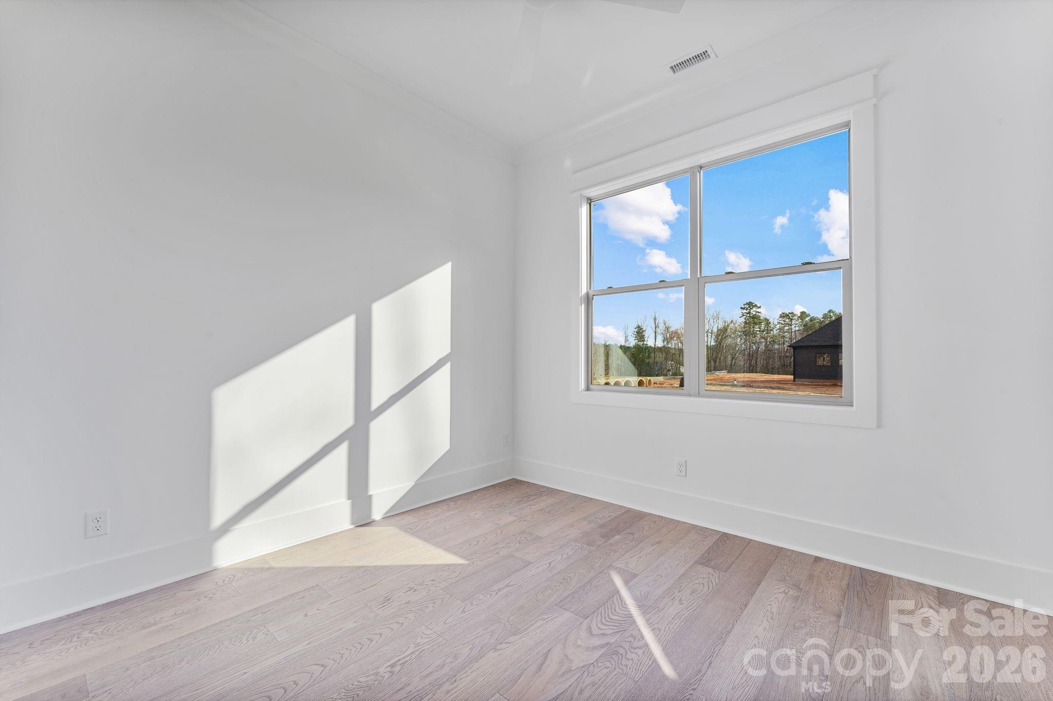 636 American Bittern Way Clover, SC 29710 - Photo 25 of 41 a view of an empty room with a window