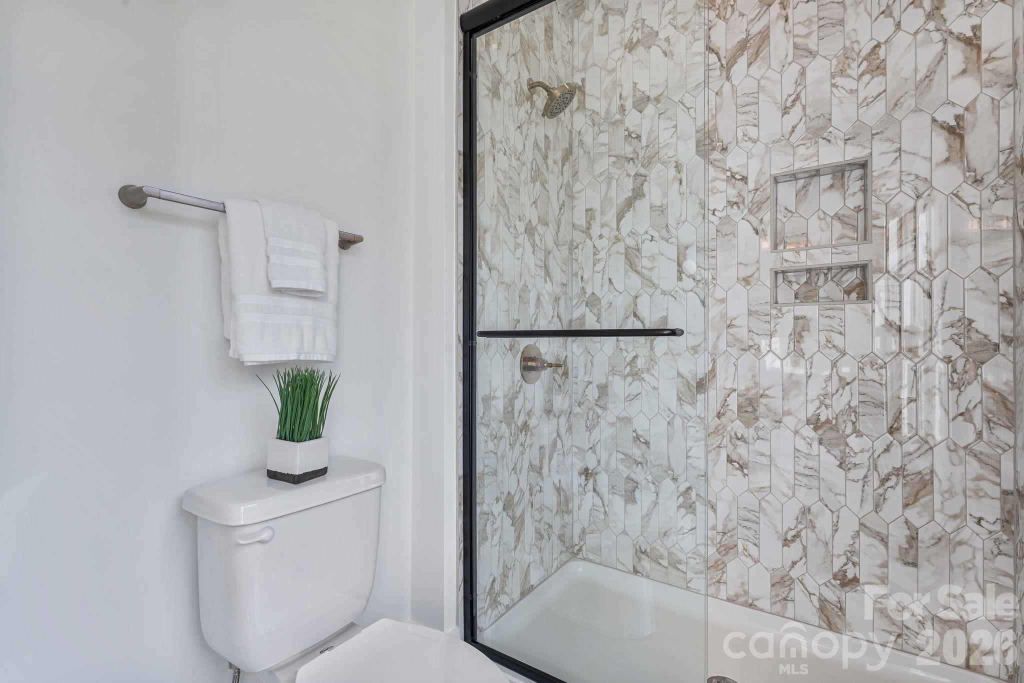 636 American Bittern Way Clover, SC 29710 - Photo 27 of 41 a bathroom with a toilet and shower