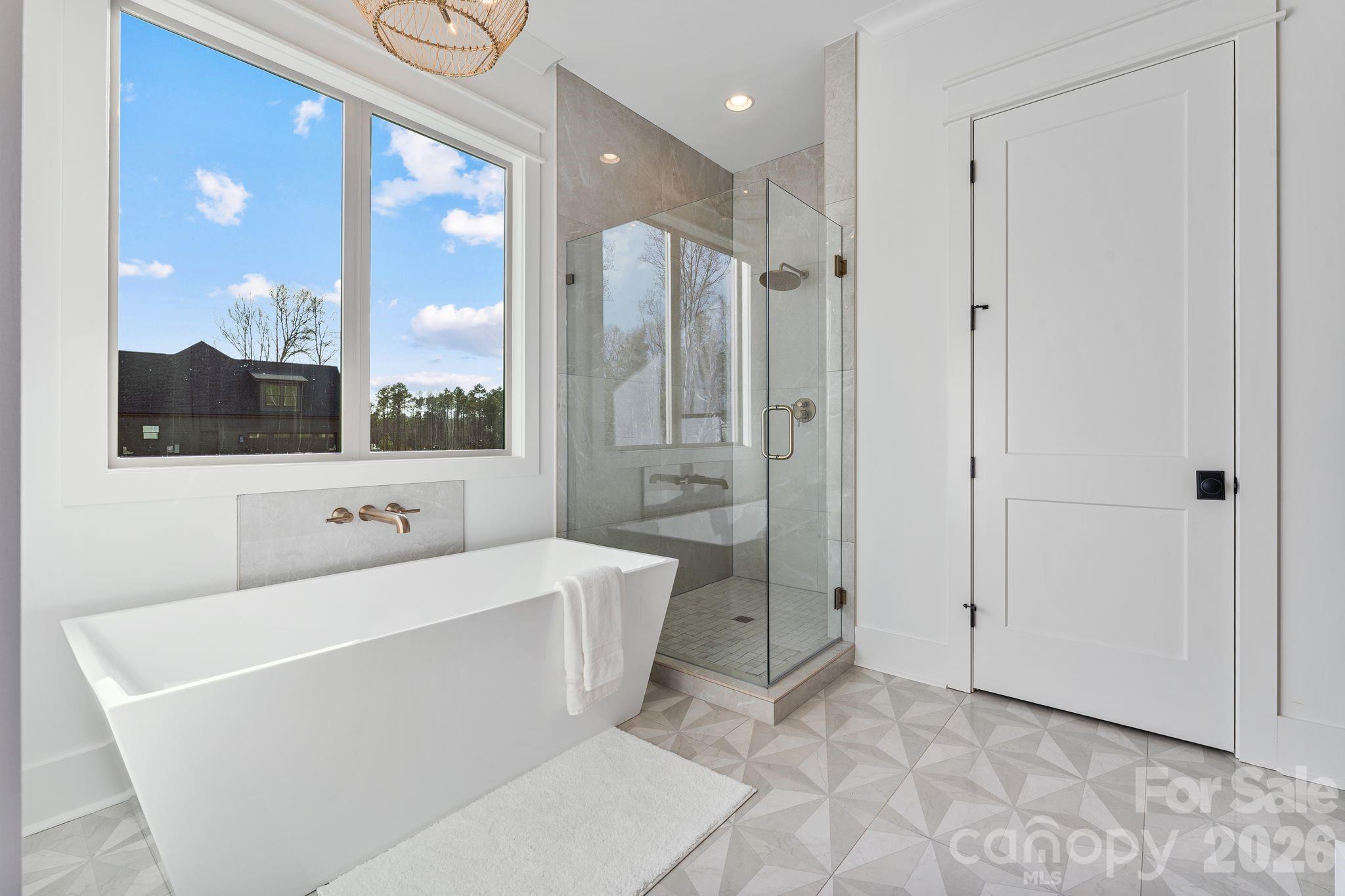 636 American Bittern Way Clover, SC 29710 - Photo 5 of 41 a room with a tub and a view of bathroom