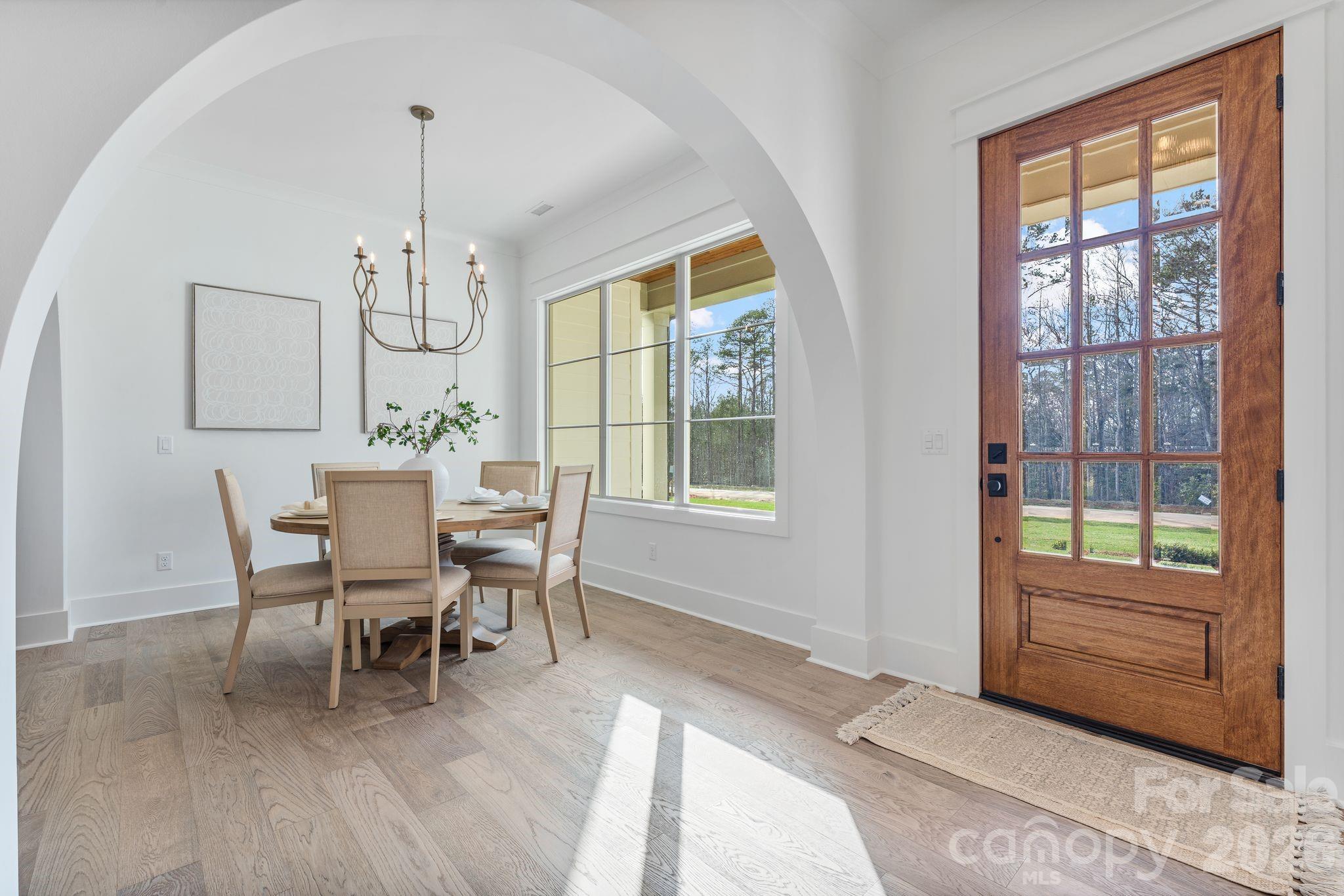 636 American Bittern Way Clover, SC 29710 - Photo 6 of 41 a view of a dining room with furniture window and outside view