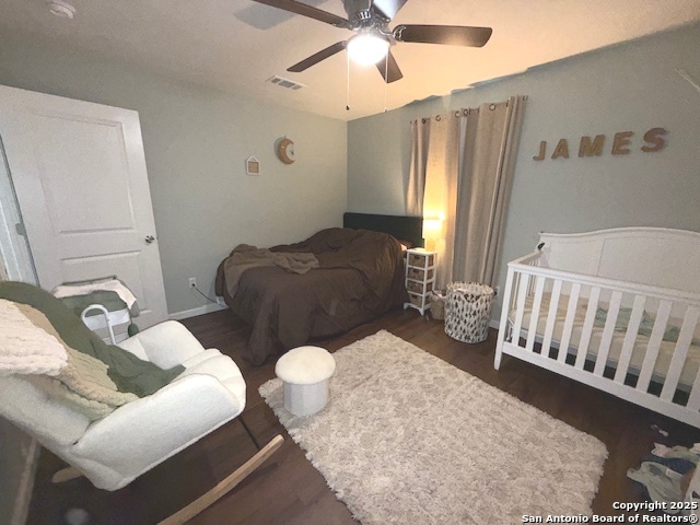 433 West Adams Street Pleasanton, TX 78064 - Photo 6 of 13 a living room with furniture and a chandelier