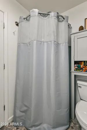 a bathroom with a sink and a toilet