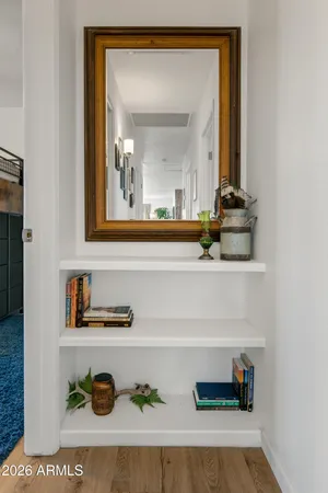 a bedroom with bed and a window
