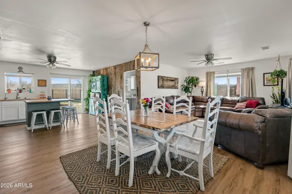 a kitchen with a sink stove top oven and microwave