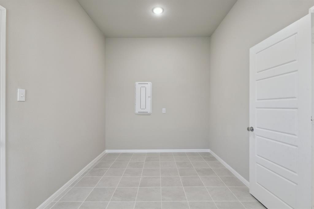 1915 Callington Way Forney, TX 75126 - Photo 23 of 24 Utility Room in the Diamond home plan by Trophy Signature Homes – REPRESENTATIVE PHOTO