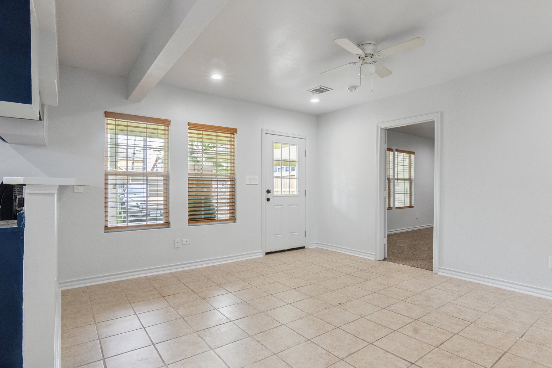 4505 Cochran Street Houston, TX 77009 - Photo 4 of 25 a view of an empty room with window and hardwood floor